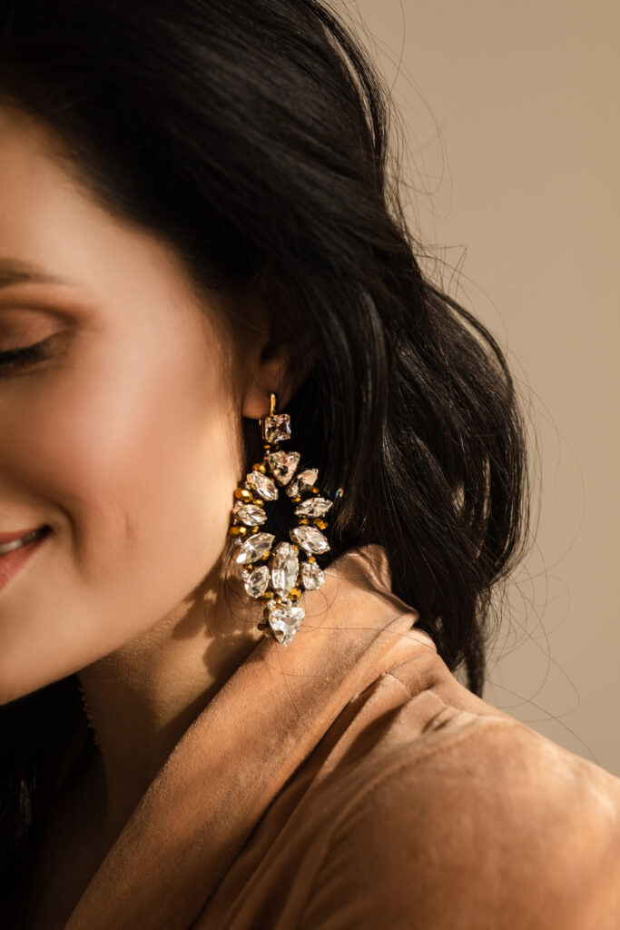 crystal earrings worn by a female jewelry model